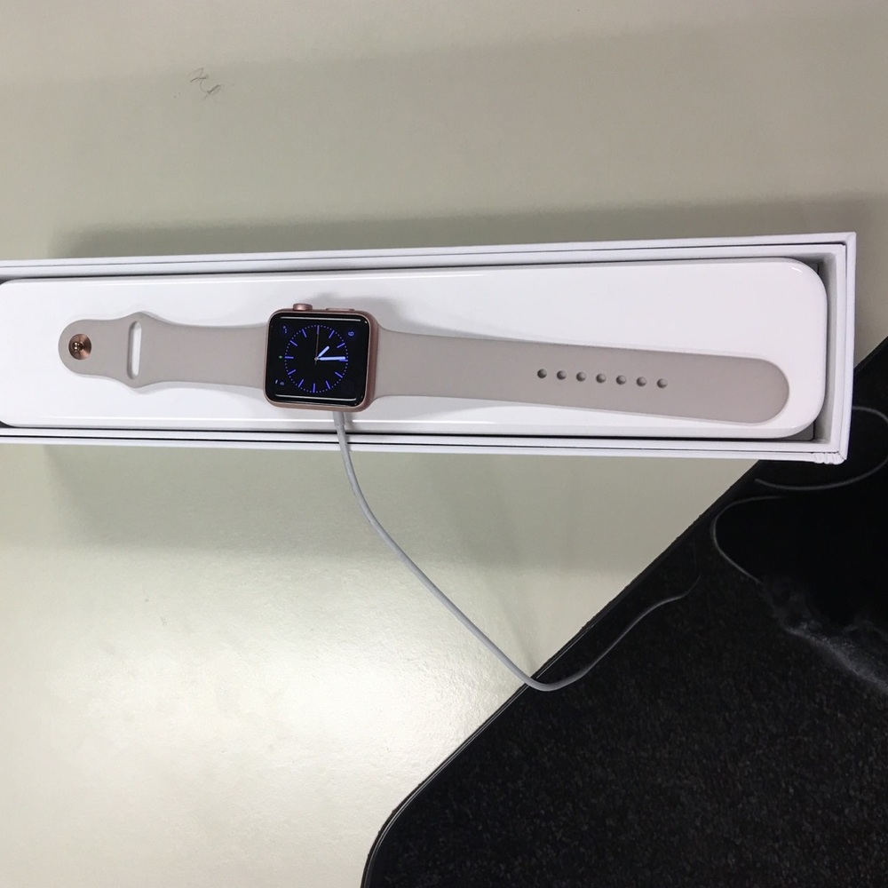 Apple Watch 42mm Rose Gold Smartwatch with Light Beige Silicone Strap